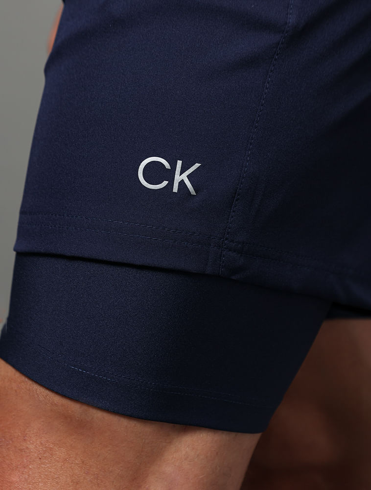 CM4OR68BT033_0598_4-BERMUDA-COM-SHORT-COMPRESSAO-CK-SPORT